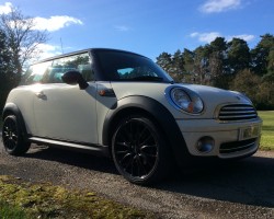 2009 MINI Cooper in Pepper White with Chilli Pack & Black John Cooper Works Wheels – which can be changed if you prefer