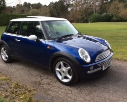 Christina is having this 2003 / 53 MINI Cooper in Blue with Chili Pack and Panoramic Glass Sunroof