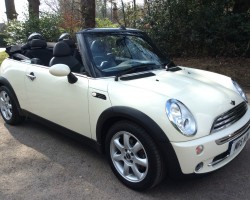 Charlie has taken this 2008 MINI Cooper Convertible in Pepper White with Chili Pack & Low Miles