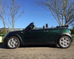 Georgia is having this 2012 MINI Cooper Convertible in British Racing Green & 14K miles Called “HOT PANTS”