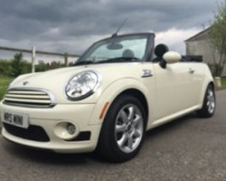 Kerry is having this 2009 / 59 MINI Cooper Convertible Chili & Visibility Packs with Sports Bodykit In Pepper White with Lounge Leather