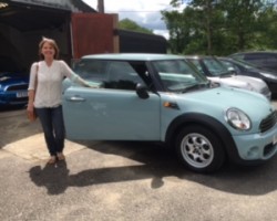 Penny also chose to upgrade her wheels on this 2013 MINI One In Ice Blue with 1 Lady Owner from New & Low Miles