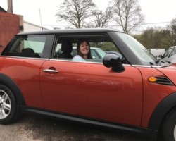 Diane has chosen this 2010 MINI Cooper Spice Orange With Chili Pack & Ridiculously Low Miles 20K