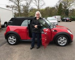 Alex has chosen this 2013 MINI One Convertible Chili Red with Ridiculously Low Miles 10K!