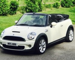 Sarah chose her this time around – 2011 MINI Cooper S Convertible in Pepper White with Black Hood