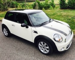 David has treated Margaret to this 2010 MINI Cooper with Chili Pack In Pepper White with Half White Leather & Low Miles 26K