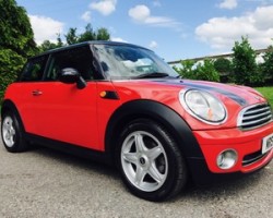 2009 MINI COOPER with Chili Pack in Chili Red with FUNKY INTERIOR THAT WE LOOVE!