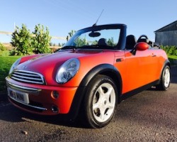 Heidi chose this 2006 MINI Cooper Convertible in Hot Orange with FULL SERVICE HISTORY