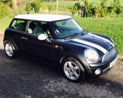 Darren & his beautiful family chose this 2006 MINI Cooper with Chili Pack with Half White Leather & Just Serviced