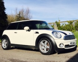 Helen & John have chosen this 2010 MINI Cooper Chili AUTOMATIC with SUNROOF & Half Red Leather Sports Seats