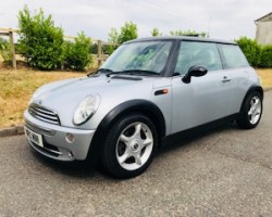 Ben has chosen this 2005 MINI Cooper in Pure Silver with Chili Pack & just 56K miles plus a Panoramic Glass Sunroof