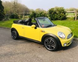 Sharron & Nigel chose this 2009 / 59 MINI Cooper Convertible in Interchange Yellow with Service History & Low Miles