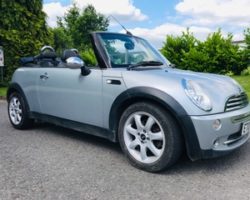 2007 MINI Cooper Convertible in Silver with Blue Hood