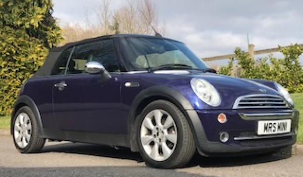 Chloe has chosen this 2005 Mini Cooper Convertible in Black Eyed Purple with Full Leather & Full Service History