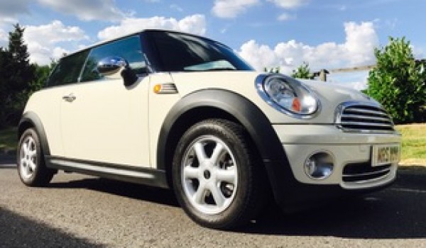 Danni chose this 2010 MINI One In Pepper White with Pepper Pack & Visibility Pack 1 Owner & only 30K miles