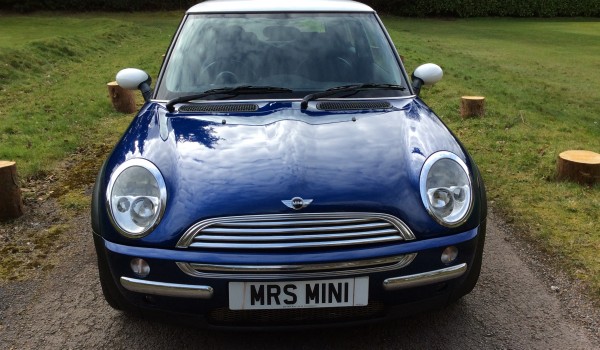 Christina is having this 2003 / 53 MINI Cooper in Blue with Chili Pack and Panoramic Glass Sunroof