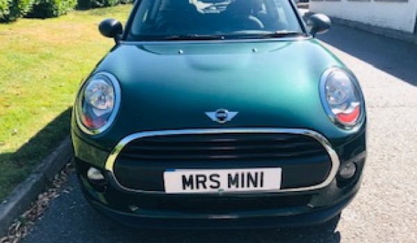Andrea chose this 2017 MINI One in British Racing Green with Low Miles