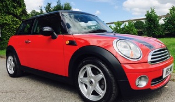 2009 MINI COOPER with Chili Pack in Chili Red with FUNKY INTERIOR THAT WE LOOVE!
