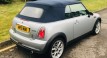 Howard and Beverley chose this 2007 / 57 MINI Cooper Convertible in Pure Silver with Blue Hood & Full Leather Heated Sports Seats