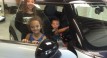 Tamara’s lovely family embracing their MINI called “Vanilla Ice Baby”  a 2010 MINI Cooper Chili In Ice Blue with Low Miles 14700 & Full Leather Seats