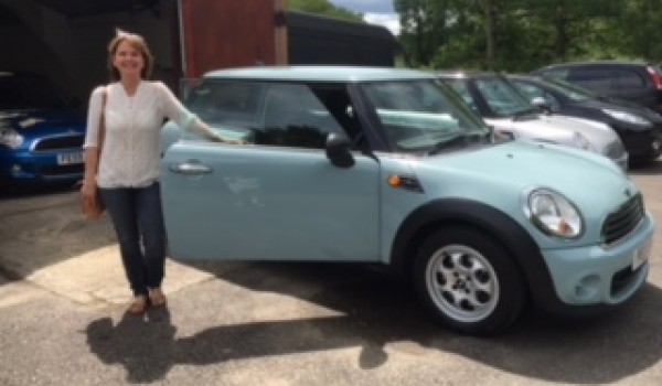 Penny also chose to upgrade her wheels on this 2013 MINI One In Ice Blue with 1 Lady Owner from New & Low Miles