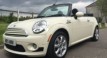 Kerry is having this 2009 / 59 MINI Cooper Convertible Chili & Visibility Packs with Sports Bodykit In Pepper White with Lounge Leather