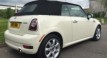 Kerry is having this 2009 / 59 MINI Cooper Convertible Chili & Visibility Packs with Sports Bodykit In Pepper White with Lounge Leather