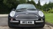 Susan is the lucky lady being treated to this 2004 MINI Cooper Pepper Pack in Astro Black with Sunroof