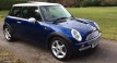 Christina is having this 2003 / 53 MINI Cooper in Blue with Chili Pack and Panoramic Glass Sunroof