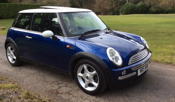 Christina is having this 2003 / 53 MINI Cooper in Blue with Chili Pack and Panoramic Glass Sunroof