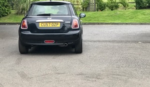 Matthew chose this 2007 / 57 MINI Cooper Chili Pack in Astro Black with Sunroof