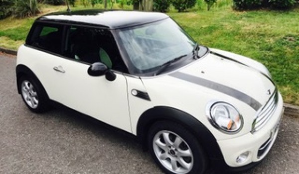 David has treated Margaret to this 2010 MINI Cooper with Chili Pack In Pepper White with Half White Leather & Low Miles 26K