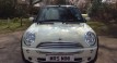 Charlie has taken this 2008 MINI Cooper Convertible in Pepper White with Chili Pack & Low Miles