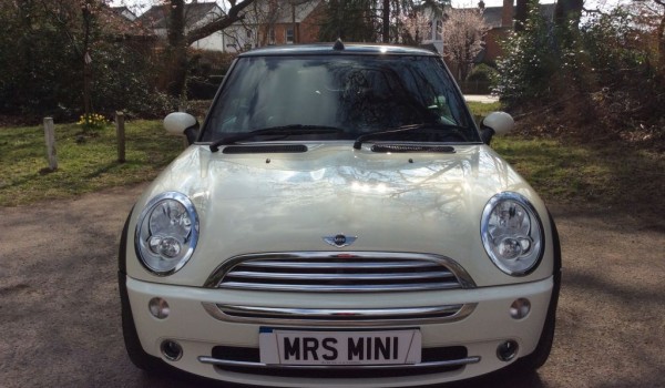 Charlie has taken this 2008 MINI Cooper Convertible in Pepper White with Chili Pack & Low Miles