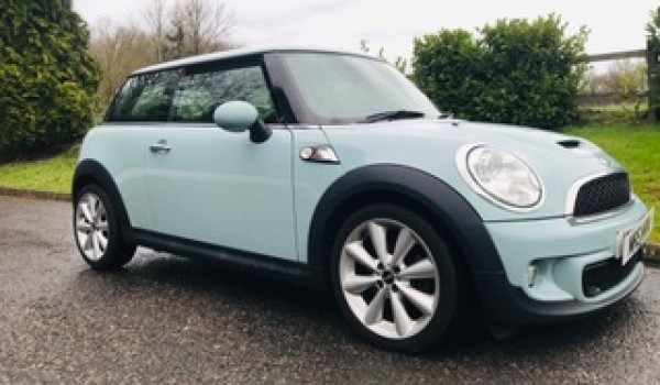 Laura Chose this 2011 Mini Cooper S in Ice Blue with Chili Pack
