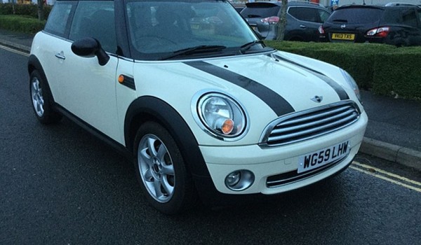 Charlene has chosen this 2009 / 59 MINI Cooper In Pepper White with Chili Pack & Ridiculously LOW MILES