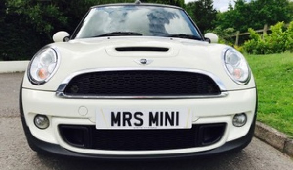 Sarah chose her this time around – 2011 MINI Cooper S Convertible in Pepper White with Black Hood