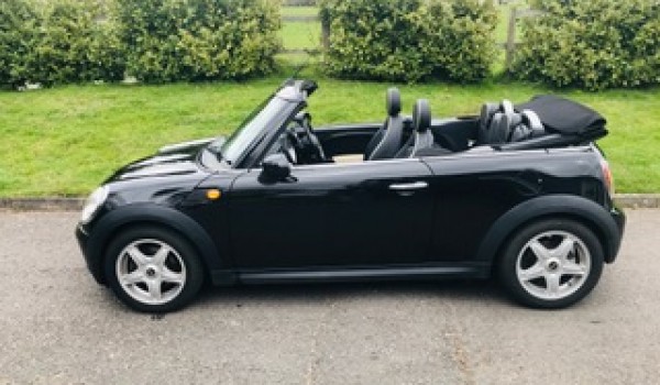 Reservation fee accepted from  Olivia who has chosen this 2009 Mini Cooper Convertible in Black with High Spec