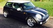 Darren & his beautiful family chose this 2006 MINI Cooper with Chili Pack with Half White Leather & Just Serviced