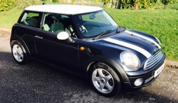 Darren & his beautiful family chose this 2006 MINI Cooper with Chili Pack with Half White Leather & Just Serviced