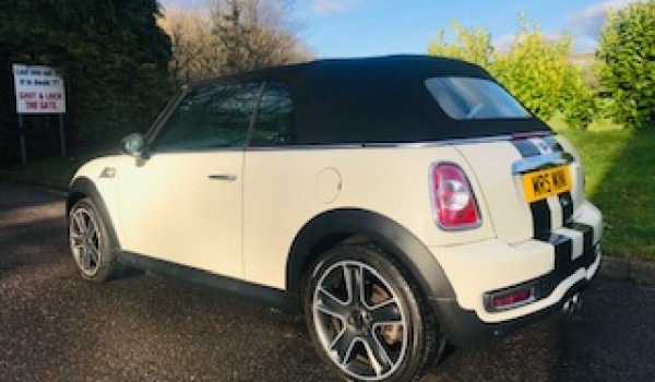 Sue chose this 2012 Mini Cooper S Convertible in Pepper White with Half White Leather Interior & Chili Pack