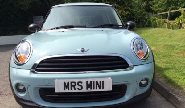 Penny also chose to upgrade her wheels on this 2013 MINI One In Ice Blue with 1 Lady Owner from New & Low Miles