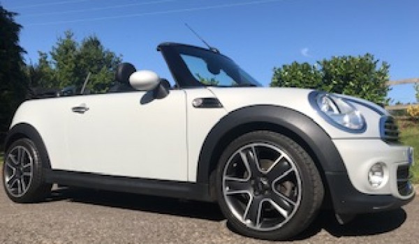 Lindsey chose this 2015 MINI Cooper Convertible with Big Spec and in Great Condition too with Low Miles