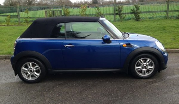 Robyn has chosen this 2012 MINI One Convertible in Lightening Blue with Pepper Pack & Heated Front Seats