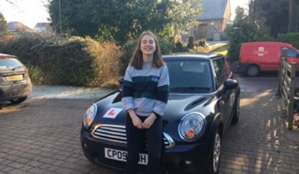 We think Alice’s daughter is pleased wither gift of this 2009 MINI Cooper In Astro Black with Low Miles