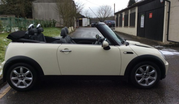 Yasmine chose this 2008 MINI Cooper Convertible Chili Pack in Pepper White