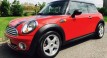 2009 MINI COOPER with Chili Pack in Chili Red with FUNKY INTERIOR THAT WE LOOVE!