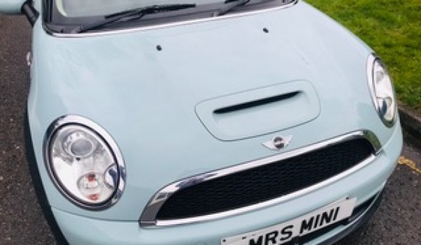 Laura Chose this 2011 Mini Cooper S in Ice Blue with Chili Pack
