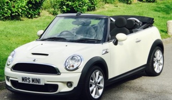 Sarah chose her this time around – 2011 MINI Cooper S Convertible in Pepper White with Black Hood