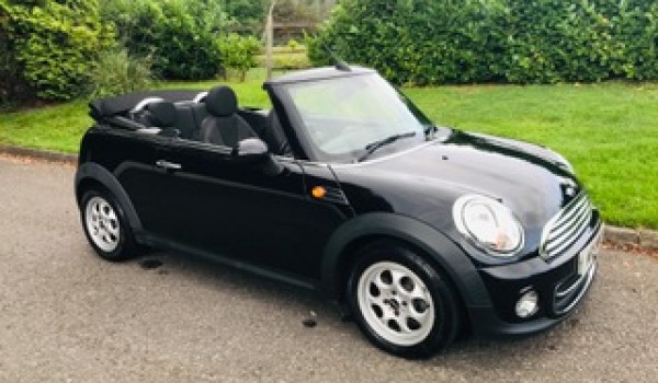 Christina chose this 2013 Mini Cooper Convertible – A rare Automatic